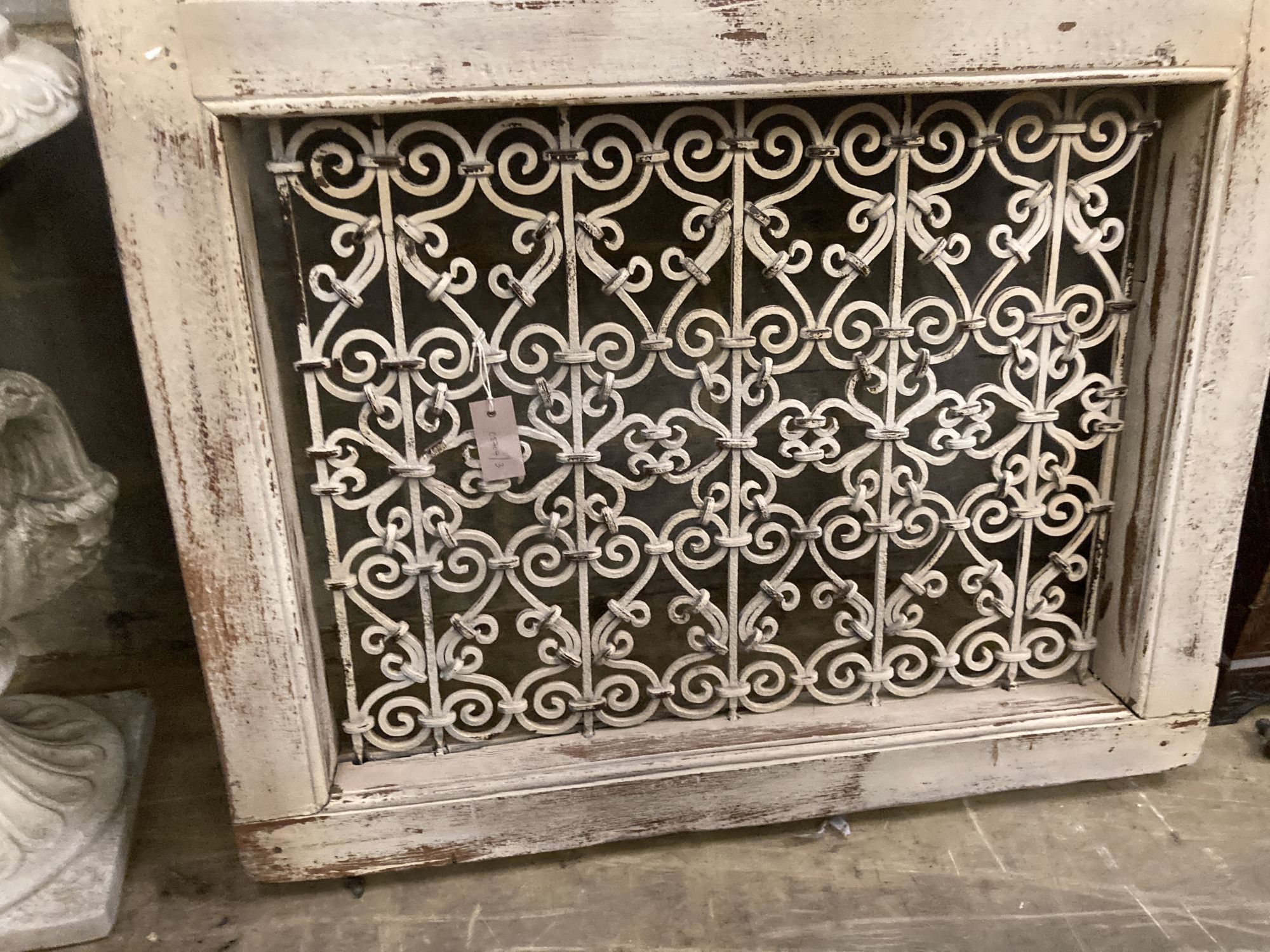 A French metal grill, painted wood wall mirror, width 91cm, height 152cm